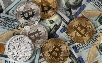 Close-up of bitcoins and US dollar bills symbolizing modern finance and cryptocurrency.