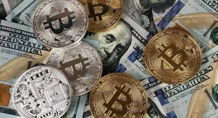 Close-up of bitcoins and US dollar bills symbolizing modern finance and cryptocurrency.