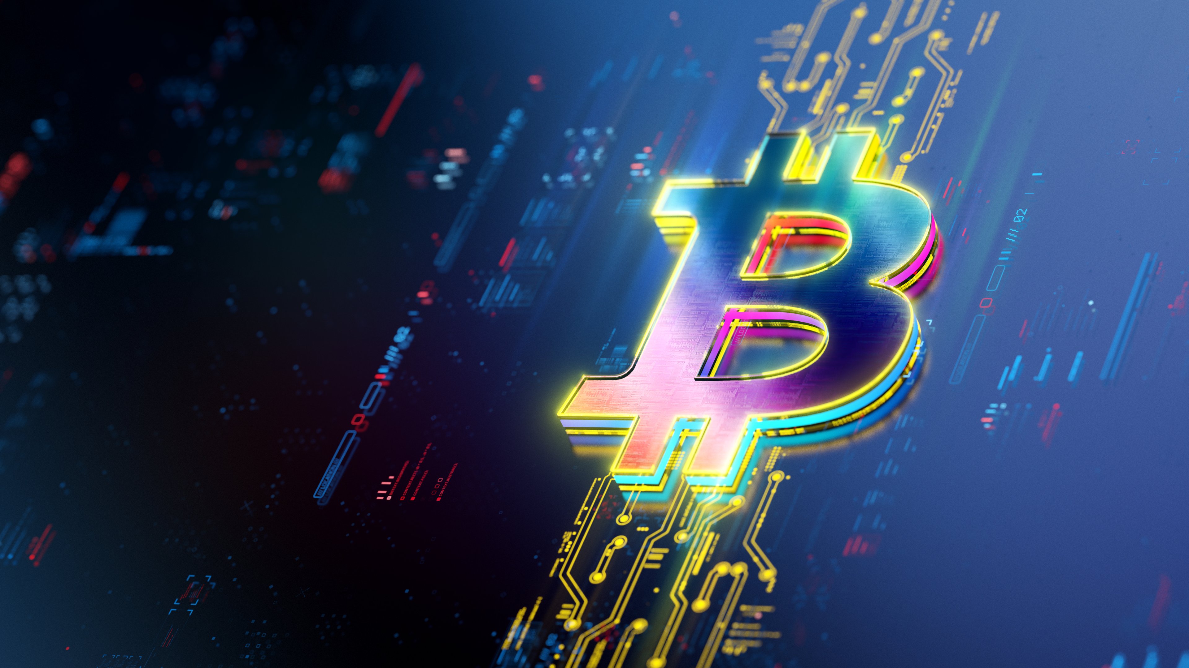 El logo de Bitcoin descansa en la parte iluminada de la pantalla que muestra los datos del precio.