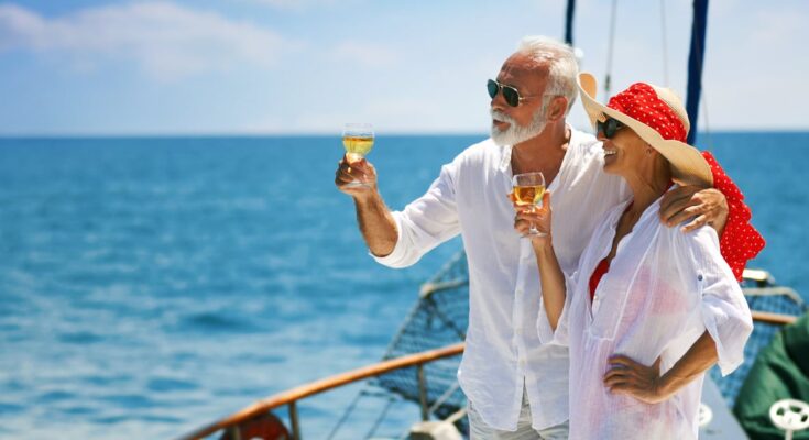 Two older investors on a yacht.
