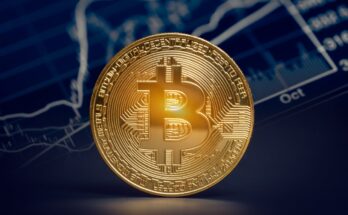 Gold coin with Bitcoin logo.