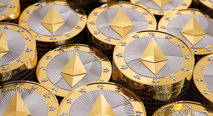 A pile of coins lay together embossed with the Ethereum logo.