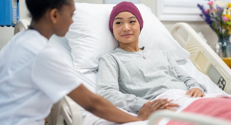 Doctor and patient in a hospital room.